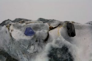 crystals of benitoite and  neptunite from San Benito County in the U.S.