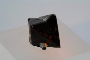 twinned crystal of cassiterite from  Krupka, Czech Republic