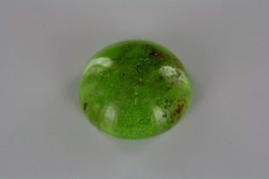 gaspeite from Quebec in Canada cut in cabochon