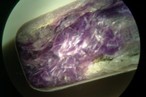 purple and white fibers of charoite