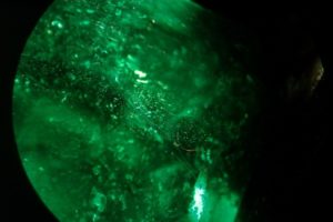 gas - liquid like inclusions, bubbles cloud, liquid inclusion planes in a Colombian emerald