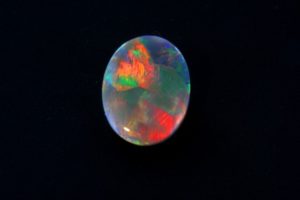 Harlequin-Opal in Cabochon, Australien