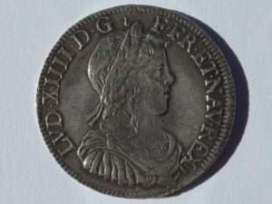 Серебряная монета 1/2 экю Людовика XIV.