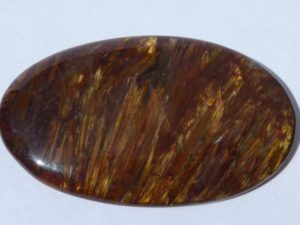 cabochon of red and yellow pietersite from China