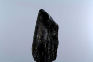 Черный необработанный тектит  из  Камбоджи.